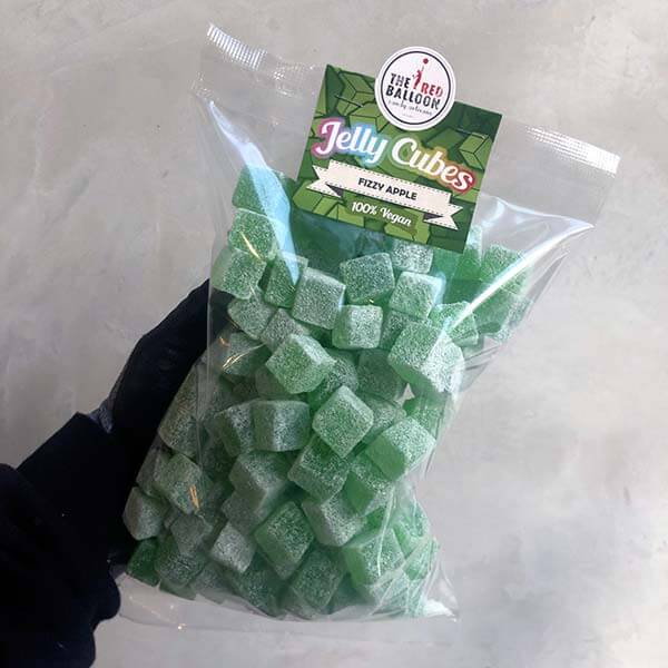 1kg bulk bag of sour apple jelly cubes. 1kg bulk bag of sour apple jelly cubes.