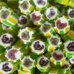 Australiana rock candy mix featuring koala (apple banana), Tasmanian devil (cola cream), crocodile (lemon lime) and frilled neck lizard (passion currant), handmade in Australia