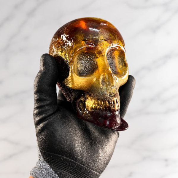 Handmade Monster Skull Candy with metallic gold and dark detailing – Halloween candy by The Red Balloon Candy Artisans