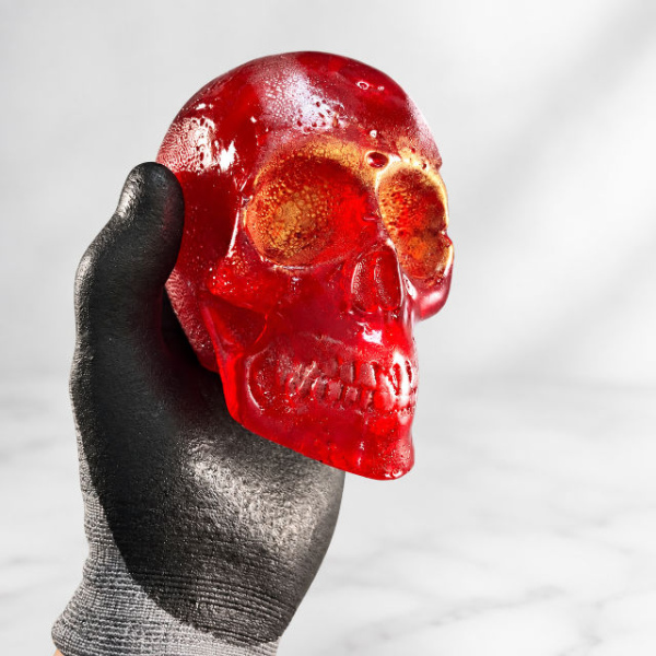 Red Monster Skull Candy with translucent red finish and gold detailing – handmade Halloween candy