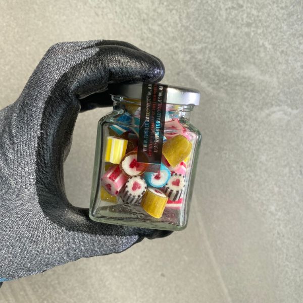 80g jar of assorted love heart wrapped candy.