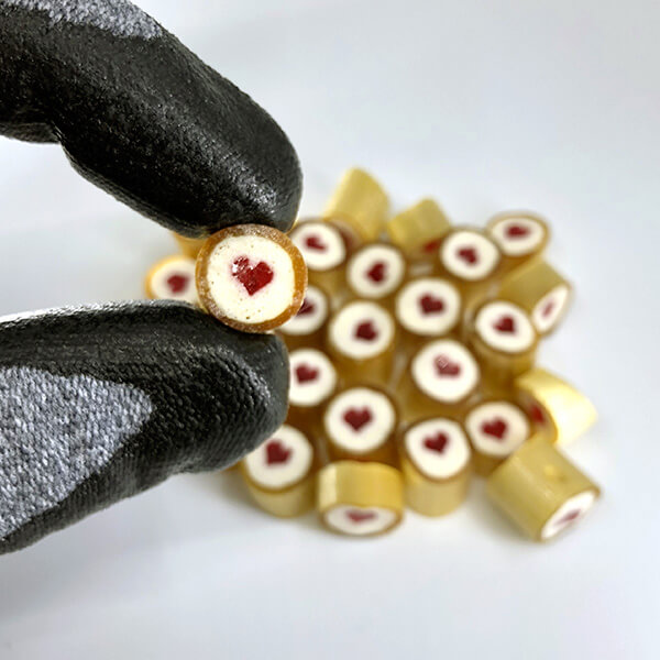 Single piece of gold love heart rock candy.