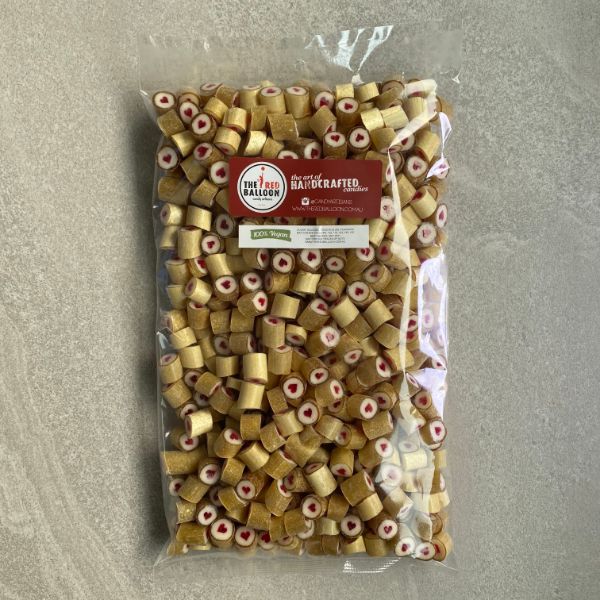 1kg bag of Gold wrapped rock candy with centered love heart.